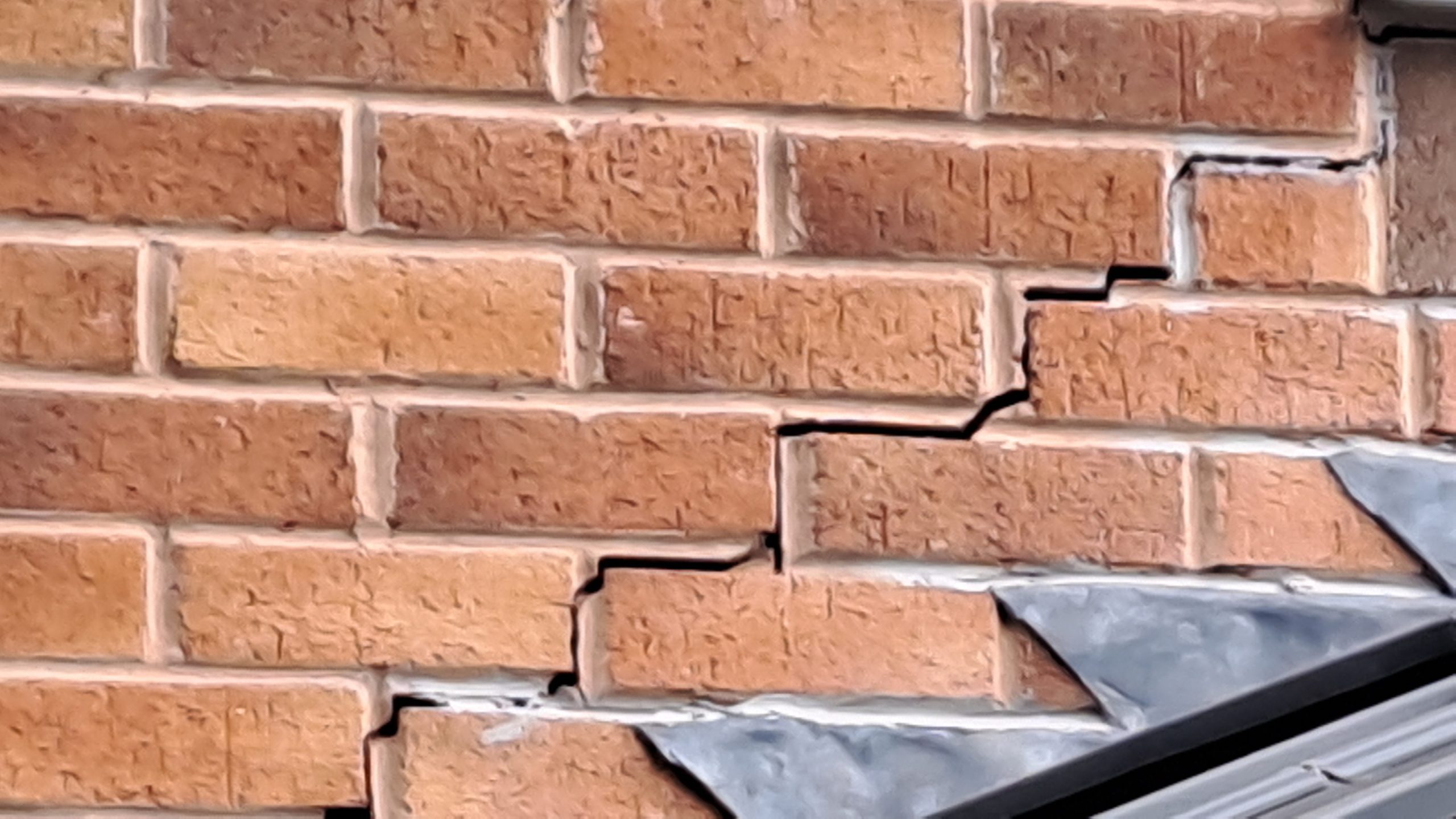 Cracked Brickwork in a Stepped Pattern